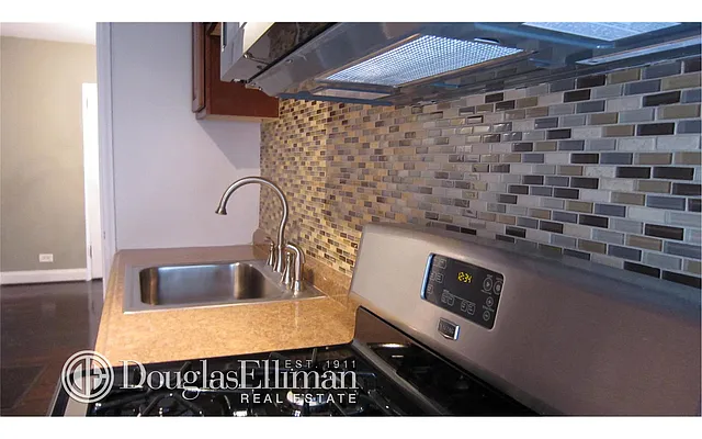 Sold by Douglas Elliman | media 18