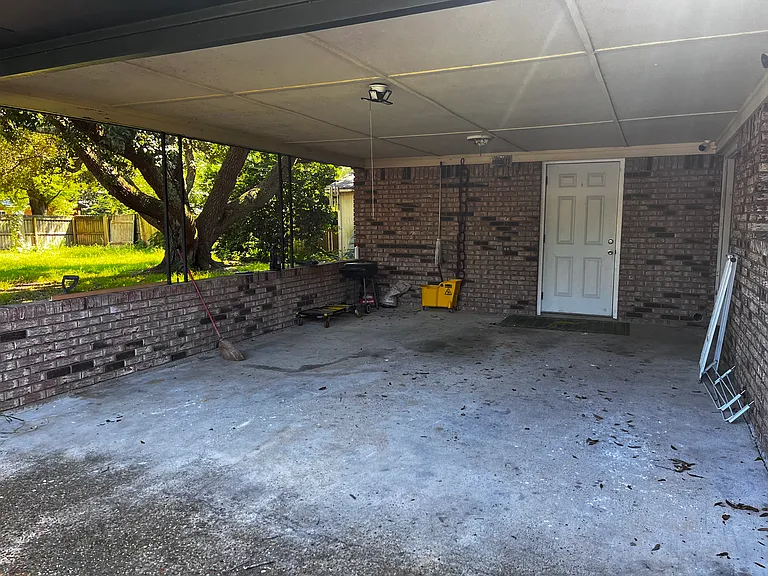 carport the door leads to laundry room