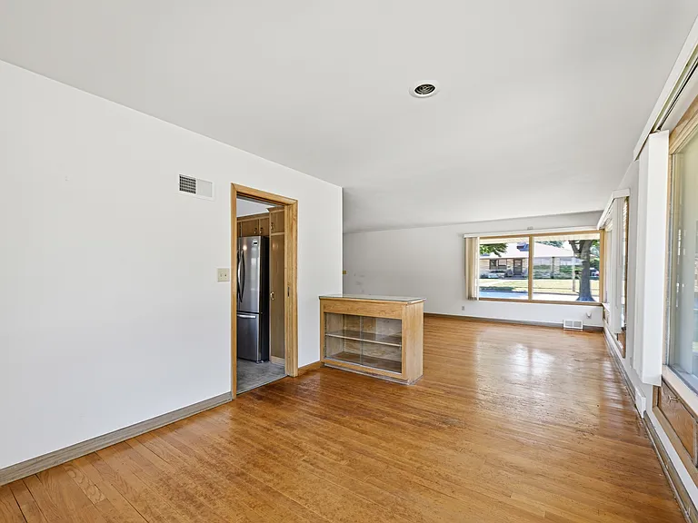 Built-In Shelving between Living Room and Dining Room