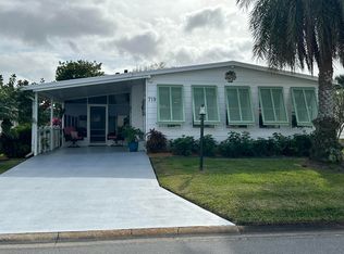 719 Bougainvillea Cir, Barefoot Bay, FL 32976