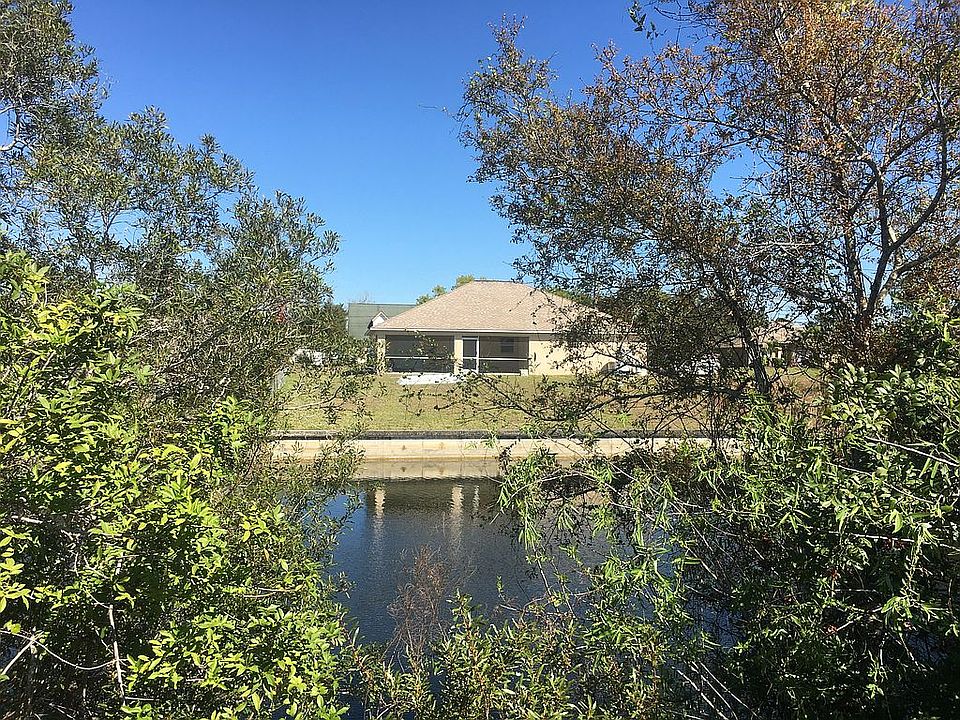 Rear of house from across canal
