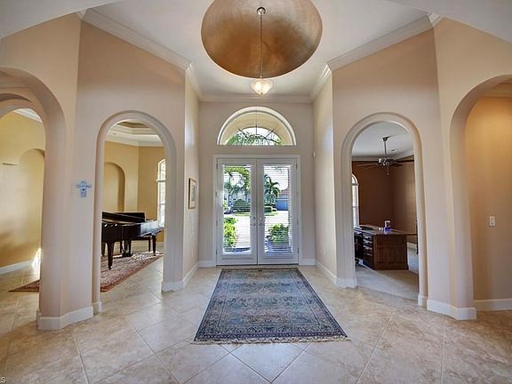The Foyer ~ Double Doors, Arched Windows