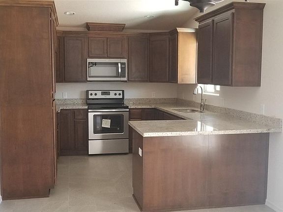 3rd image of 10431 E 38th St
