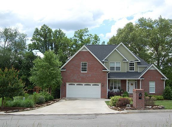 Professionally landscaped, lots of curb appeal.