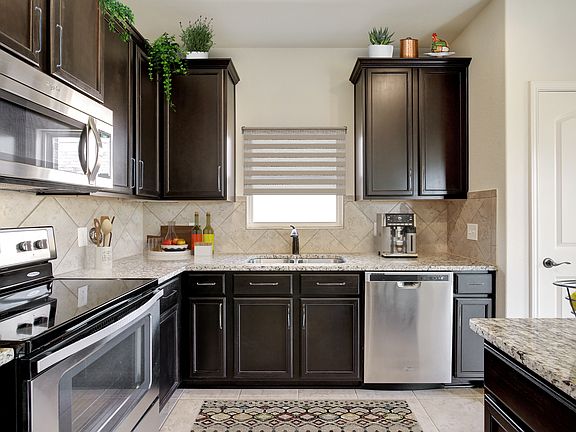 The Erie features gorgeous, stainless-steel appliances in the kitchen