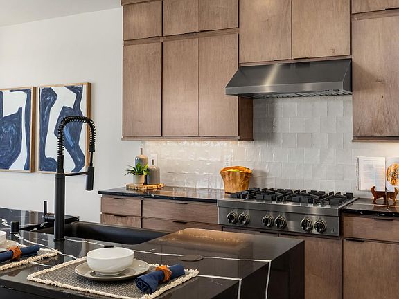 On-trend, stained contemporary flat-panel cabinetry