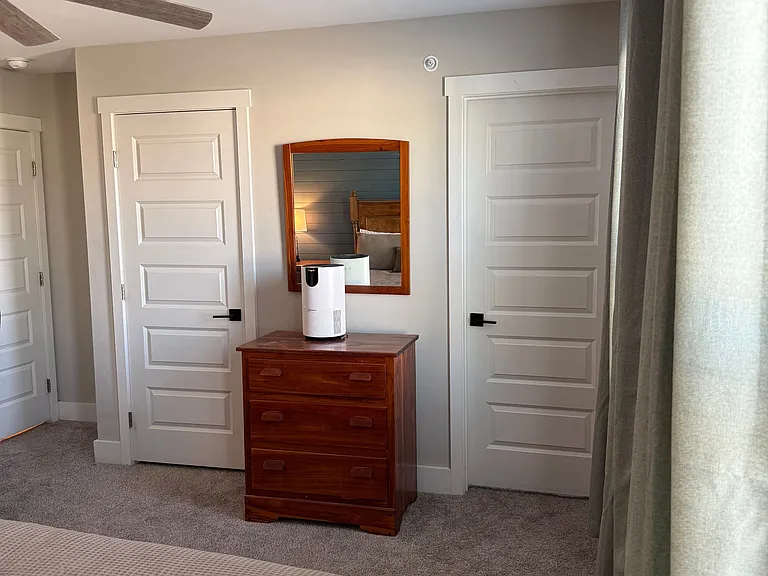 This room features two closets, one being a walk-in closet.