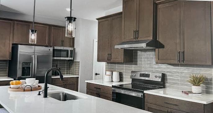 This is the actual color of the cabinets "Sonoma Maple Slate"