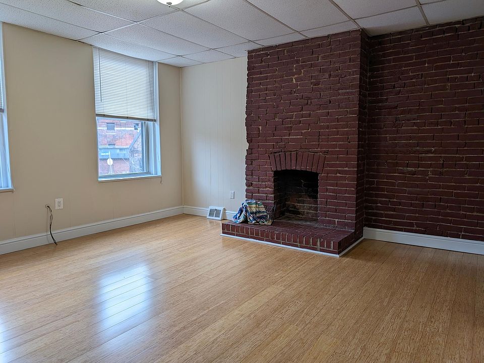 Brick fireplace perfect focal point of the living space.