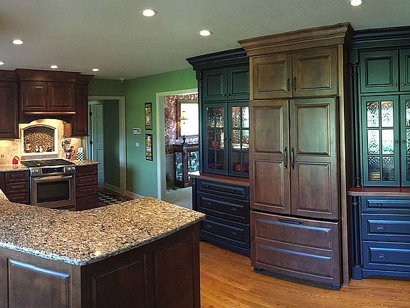 Kitchen & paneled Refridge.