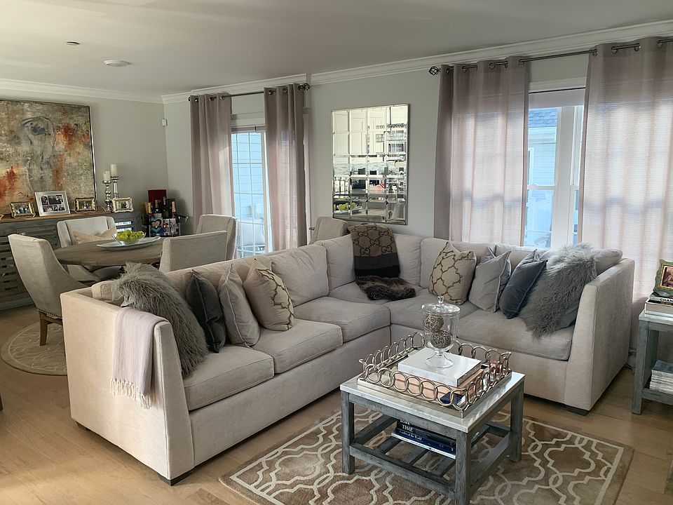 Living room-depicting different decor layout with couch and dining table