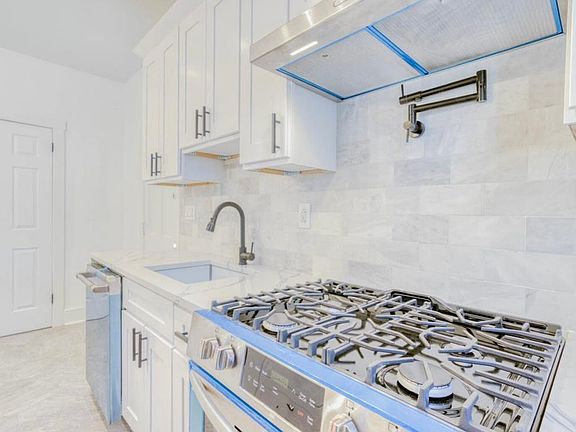 5th image of 218 E 8th Ave
