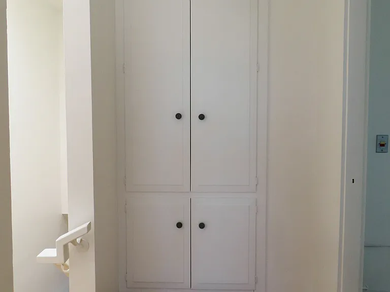 Linens closets at top of stair landing