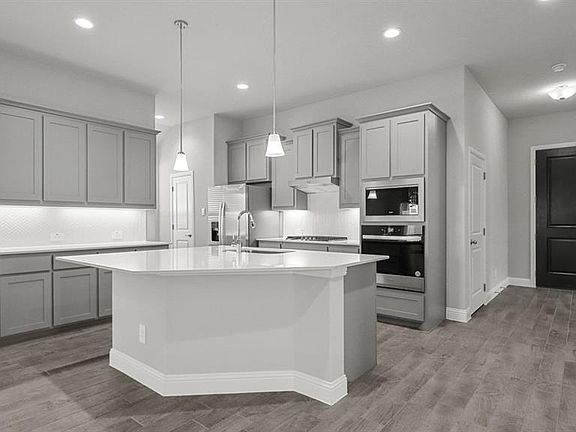 Kitchen-All Home and community information, including pricing, included features, terms, availability and amenities, are subject to change at any time without notice or obligation. All Drawings, pictures, photographs, video, square footages, floor plans, elevations, features, colors and sizes are approximate for illustration purposes only and will vary from the homes as built.