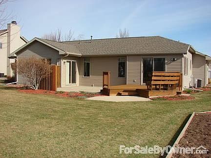 Rear of Home
						:
						View from edge of garden looking at deck