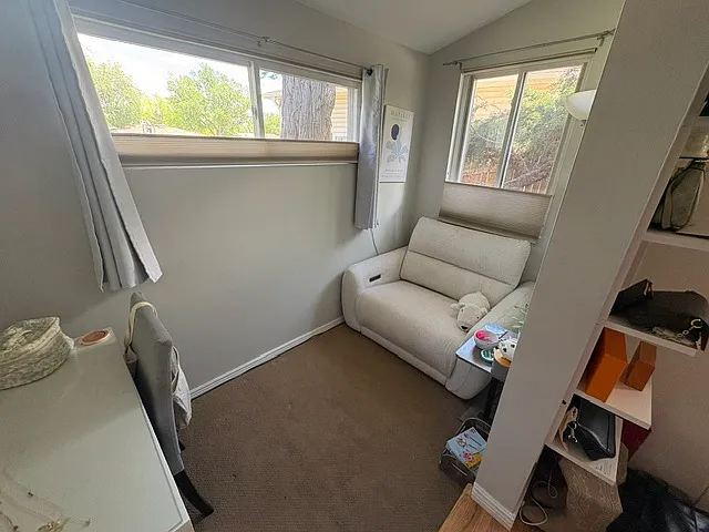 main floor bedroom with on suite, added office/sitting room