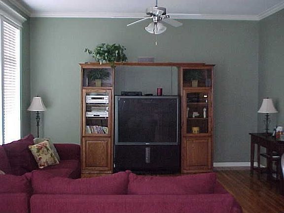 Hearth Area off of Kitchen has Hardwood Floors & Ceiling Fan