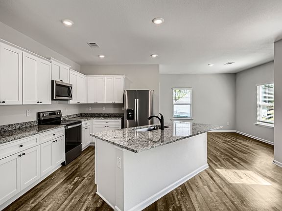 Beautiful white cabinets with hardware in the Jackson by LGI Homes