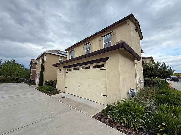 Charming front view with attached garage