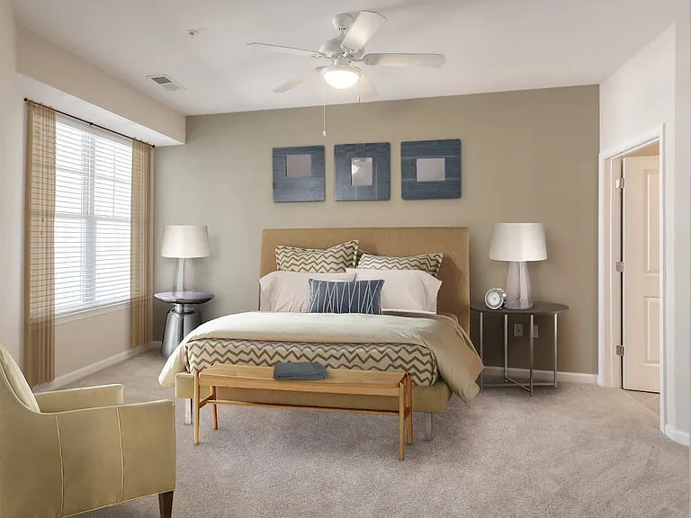Bedroom with accent wall and carpet