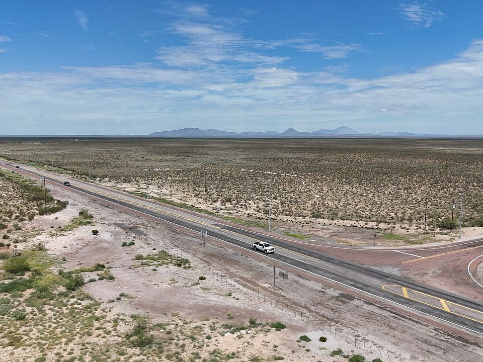 Looking North at the intersection of Ranch Rd 1437 and US Highway 62/180. Pending a survey, sellers may not own a small tract of this intersection on the West side corner