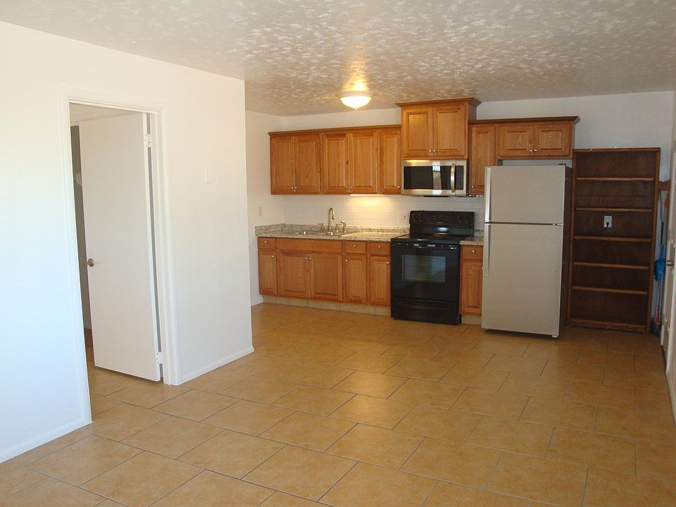 Kitchen with plenty storage, flat ceramic stove, microwave, fridge with Ice maker, extra deep sink with under-cabinet soft light