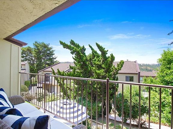 Balcony off living room with storage closet