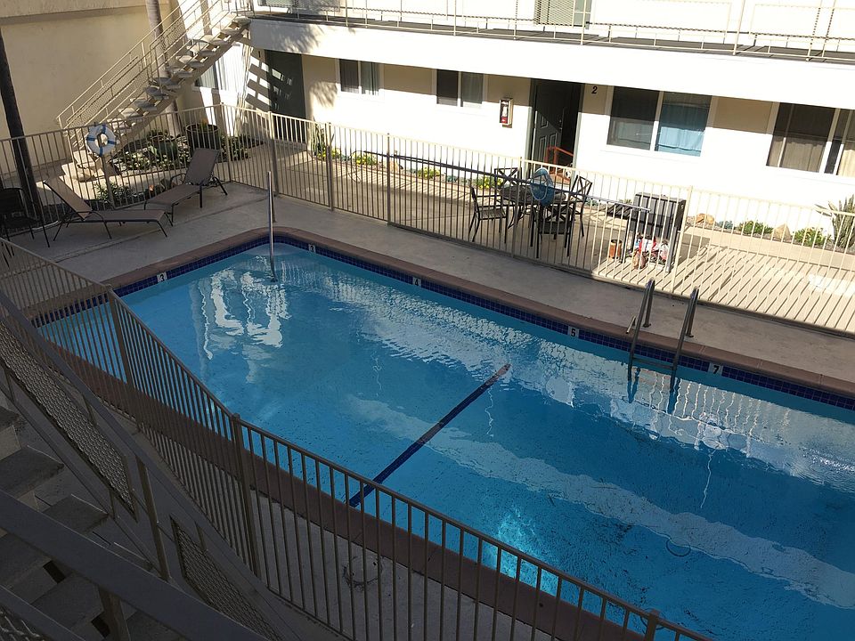 Pool, BBQ, and table and chairs for all tenants to use.