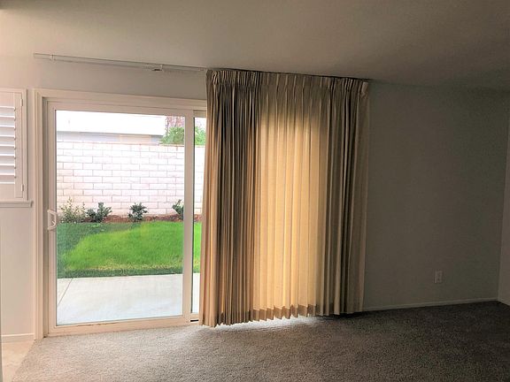 Master Bedroom w/ French Doors to back yard.