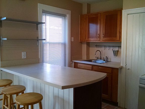 New counter tops, cabinets, sink, garbage disposal and oven