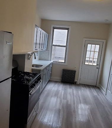 5th image of 77 Driggs Ave #1