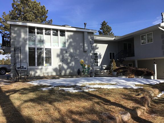 Rear view of home. Unit has top down and bottom up blinds.