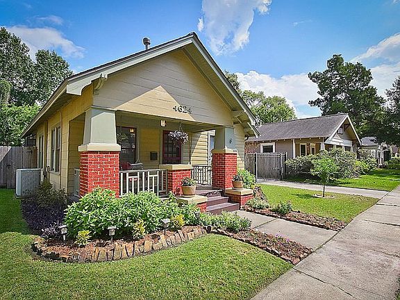 Elegant landscaping that adds to the charm of this 1930 s bungalow. Wonderful curb appeal on this quite Norhill street.