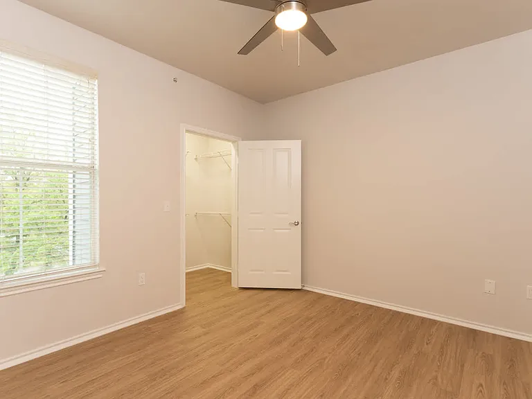 Bedroom with hard surface flooring