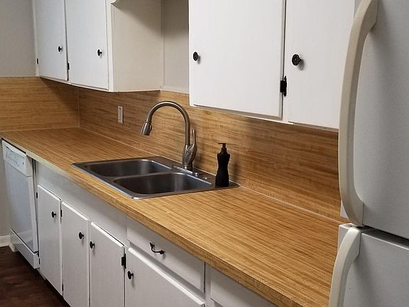 SO MANY CABINETS
 All lined with new liner (including a cute buffalo check liner under the sink)