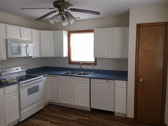 Great sized eat-in kitchen with newer cabinets...all appliances stay with the home.