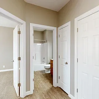 View off Front entry to 2nd bed & bath. Coat closet and linen closet in this area.