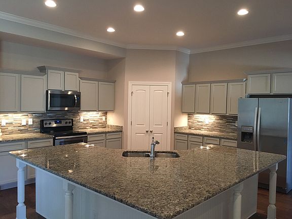 File photo Pictures are from an older community Cabinets and style have been modified for this ne