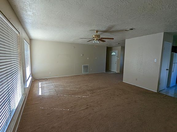 Inside front door and view of Living Room