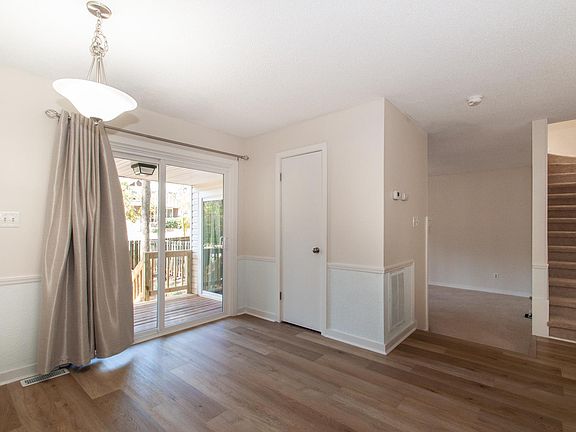 Dining Room looking into Family Room & Stairs to 2nd floor
