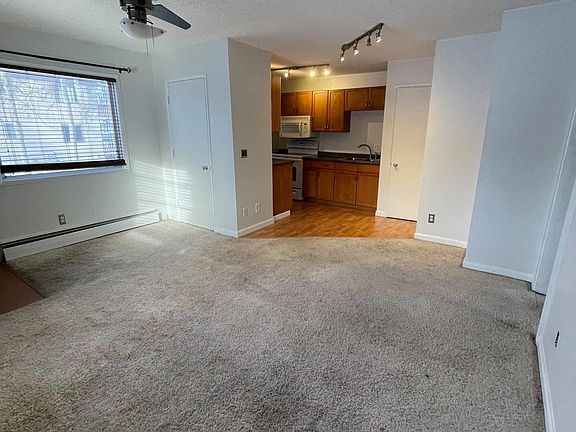 Living room facing kitchen