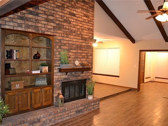 Gas wood burning fireplace with storage