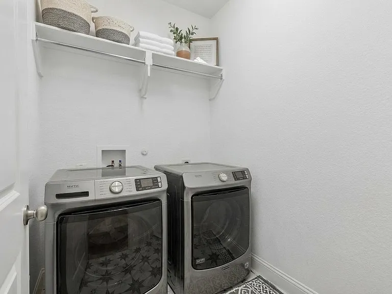 Washer and dryer stay with the property.
