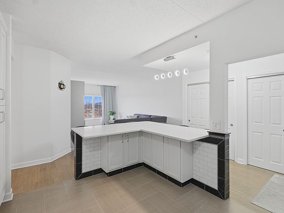 5th image of 9670 Franklin Ave Unit 411