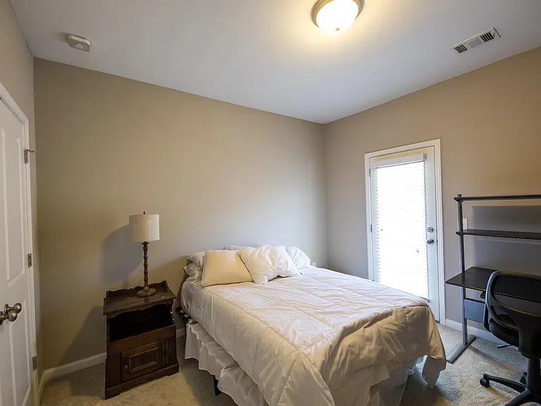 2nd Bedroom with custom closet and walk out balcony