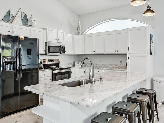 Kitchen island with four bar stools