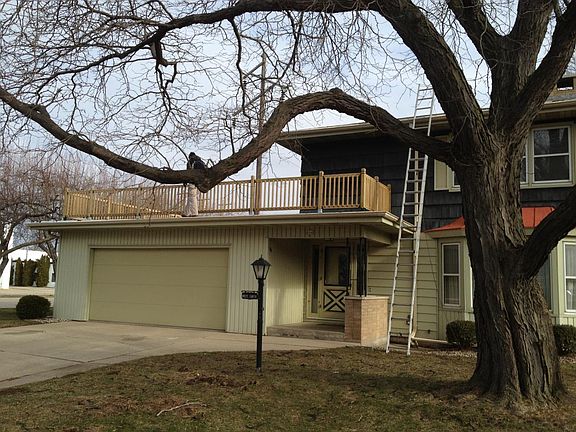 front of house with roof top deck