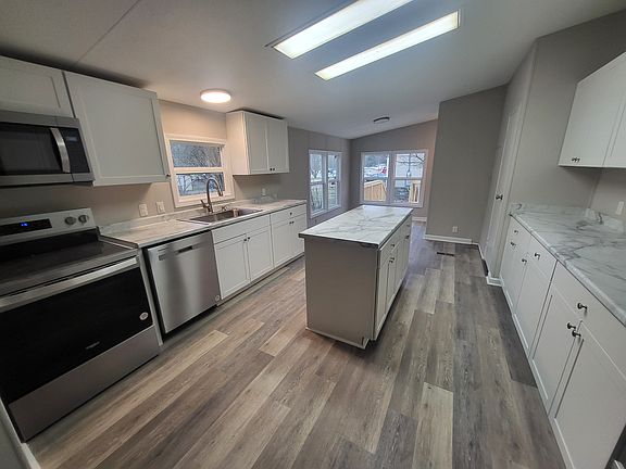 Large open kitchen with island.