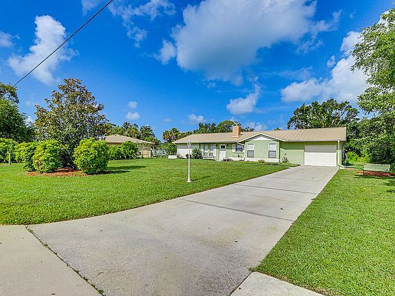 From of home long driveway