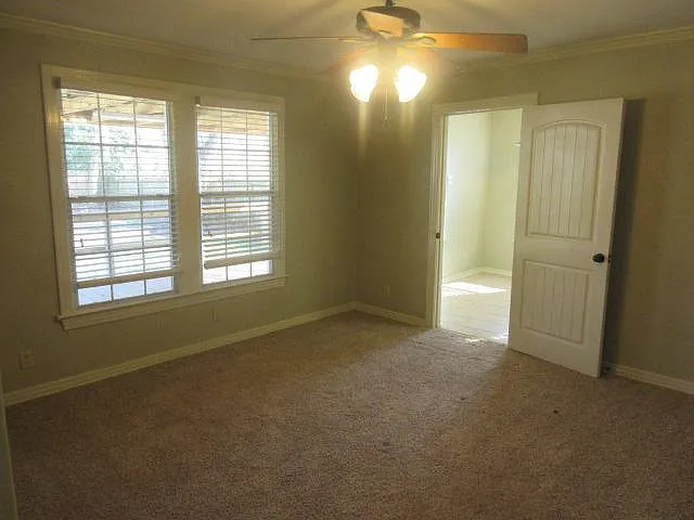 Bedroom #2 is off the kitchen